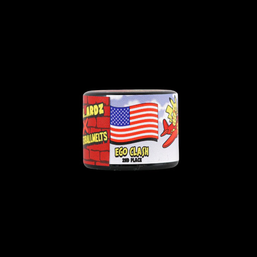 A close-up shot of Master Ball Melts' Grape Gas dessert, showing its vibrant color and texture.