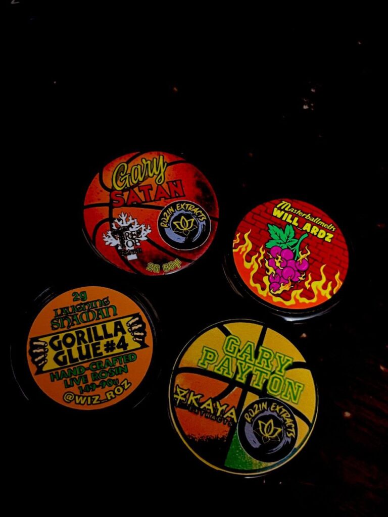Four branded rosin containers featuring Gary Satan, Gary Payton, Grape Gas, and Gorilla Glue #4