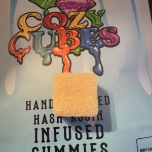 Banana Boat Cozy Cubes x Master Ball Melts gummies in tropical-themed packaging with creamy banana visuals